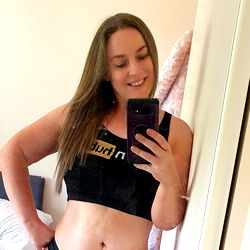 OnlyFans Model Alphaninja7 - Lozza in a Stylish Black Tank Top Taking a Selfie