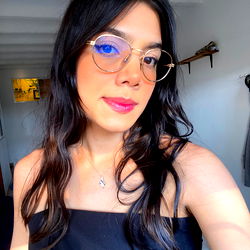 Stylish Female with Pink Lipstick and Blue Eyeglasses in Trendy Glasses