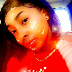 Asia, OnlyFans Model, in a Red and Black Shirt