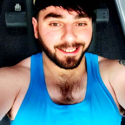 Fitness Influencer AJ Poses with Machine