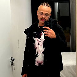 André Carlos in a Stylish Black Outfit, Taking Selfie in Mirror