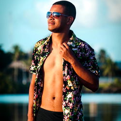 Aisaque Marques in Hawaiian Shirt and Shorts by Lake