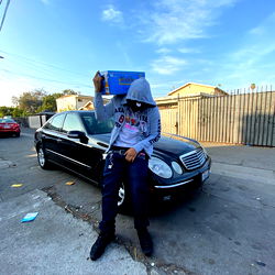 Rapper Kandyshxp Poses with Boxed Snacks