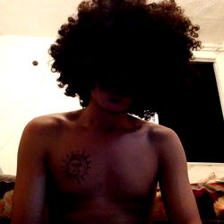 Amador Saliente, Young Adult with Afro