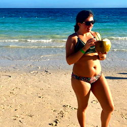 Beach Girl with Coconut