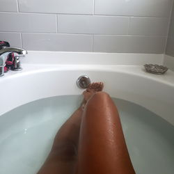 Model Desire in Bath Tub Photo