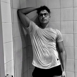 Fitness Model Alexis Caraballo Shows Off His Wet and Muscular Body