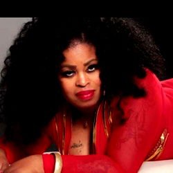 Foodie Model Posing in Stylish Red Dress for Onlyfans