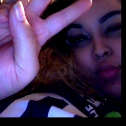 Woman's Peace Sign in Selfie