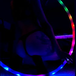 Vivid Vixen Under Glowing Rings