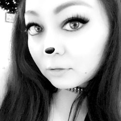 AznCougarLuv, a young woman with a playful smile and a cat ear headband, }