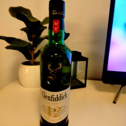 A Bottle of Fans Whisky on Display