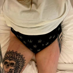 Cute lingerie-clad OnlyFans model with a tattoo, in Midwest