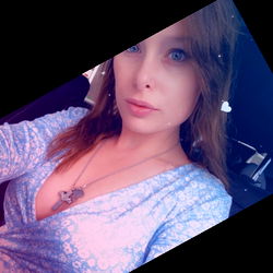 Stylish Model Posing for Photos in a Blue Dress