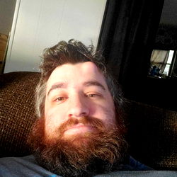 Bearded Man with Shaggy Hair