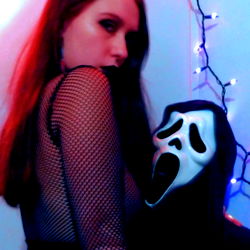 OnlyFans Model Aqua Posing with a Creepy Clown Mask