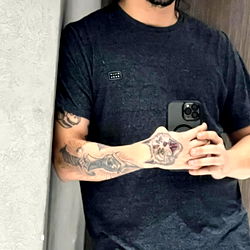 Underwear Model Alexxx Posing with a Phone