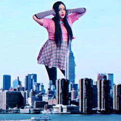 Fashionable Influencer Ambrosia Strikes a Pose Against the Backdrop of an Iconic Skyline