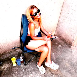 Aunty Coco's Casual Moment with Her Crocs and Drink