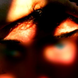 Artistic and Intimate Close-up Portrait with Blurred Background