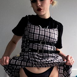 Miss Myra in a Checkered Dress