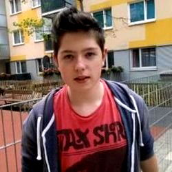 Youthful Skateboarder on City Street