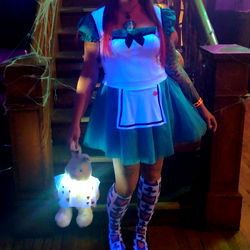 Cosplayer in Nurse Costume with Teddy Bear