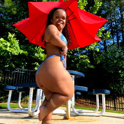 O in Blue Swimsuit at Poolside