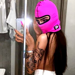 Actitud_Female in Pink Mask with Tattoo