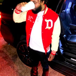 Houston Rapper BraveDave Enjoying a Drink on the Street