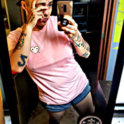 Fashionable OnlyFans Model Showcasing Personal Style