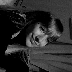 Anna, a young woman in a room