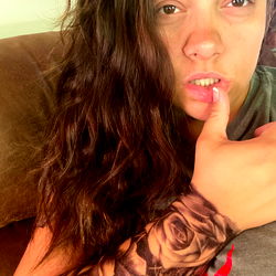 Laker's Tattooed Arm and Hand