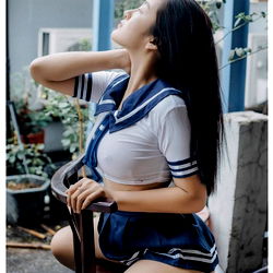 Model Nguyên Thuỳ Gia Linh in a Sailor Outfit, Exuding Elegance