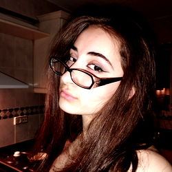 Sexy Model in Kitchen, Wearing Glasses