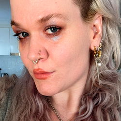 Stylish Tattooed Model Posing for Instagram