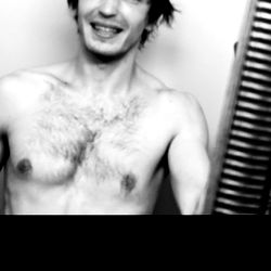 Aleksqrdn, a Fitness Model Showcasing His Shirtless Body