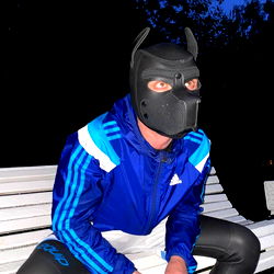 Model in Costume and Sneakers Posing on Bench