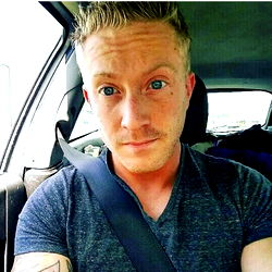 Ray, a young adult male with blue eyes and blonde hair