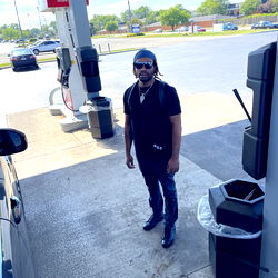 Model Posing in Gas Station Parking Lot