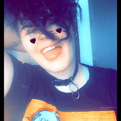 Viral OnlyFans Post Featuring Ash, 25-year-old Tattooed Model with Cropped Hair