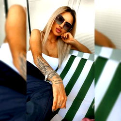 AichaOne, Model and Influencer, Sitting on a Lounge Chair