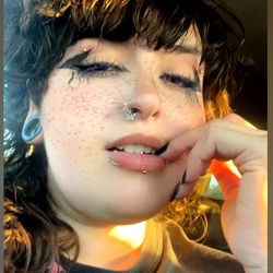 Amber Sweet, a 27-year-old female with captivating eyes and striking lipstick. A Miami influencer who has turned heads with her unique style and engaging personality.