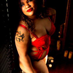 Onlyfans Model in Red Lingerie on a Post