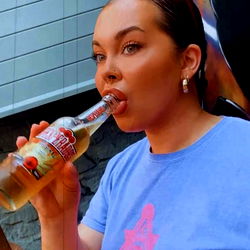 Woman Enjoying a Beer