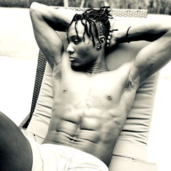 Fitness Model Trister Bbc Relaxing on a Deck Chair