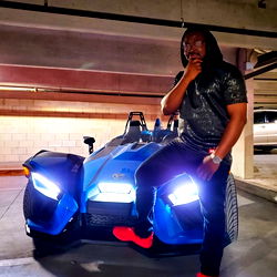 Model in Vivid Blue Sports Car