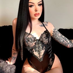 Stylish OnlyFans Model in Black Lace Lingerie