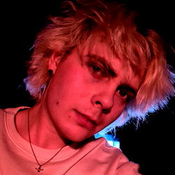 Ari, a punk rocker with spiky blonde hair