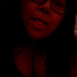 A Close-Up Portrait of a Girl in Glasses